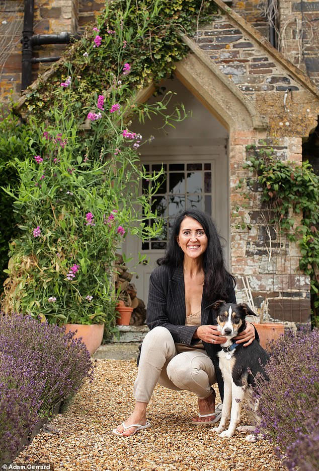 Liz at her Somerset home in 2010 with Gracie. Liz has opened up about the hardships of losing her