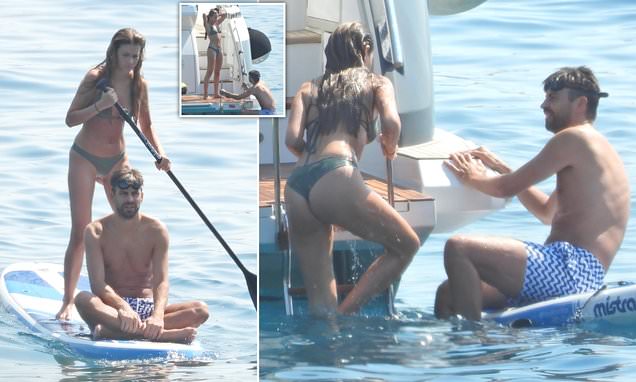 Gerard Piqué, 36, showcases his buff body during romantic paddleboarding session with